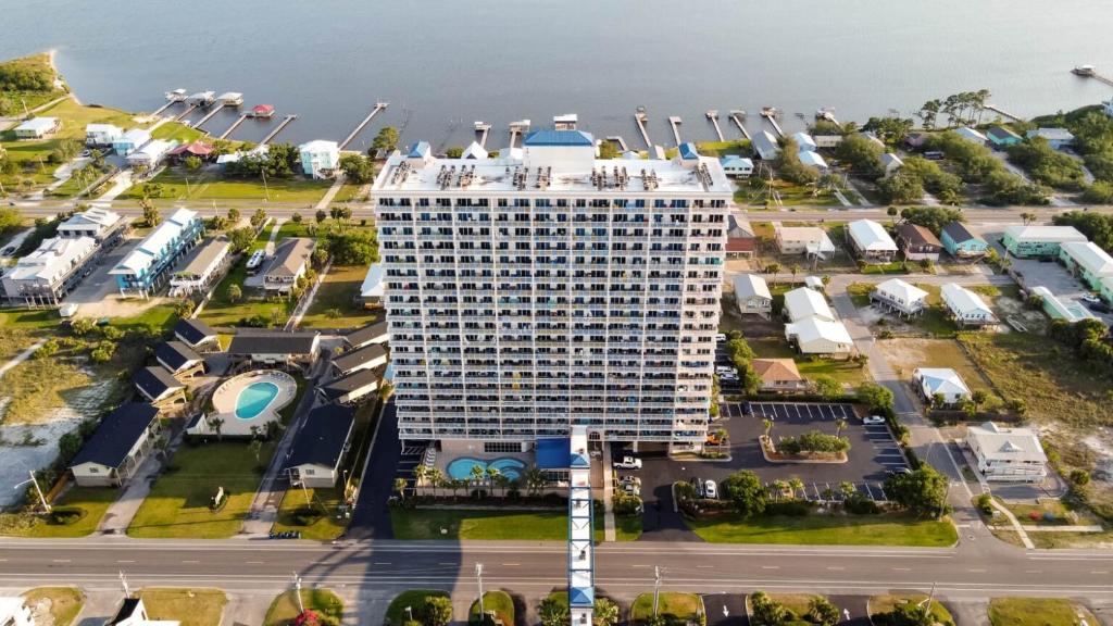 an aerial view of a large white building at Crystal Tower 1906 by Vacation Homes Collection in Gulf Shores