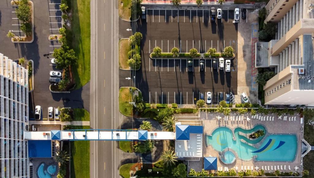 an aerial view of a parking lot with cars at Crystal Tower 1906 by Vacation Homes Collection in Gulf Shores