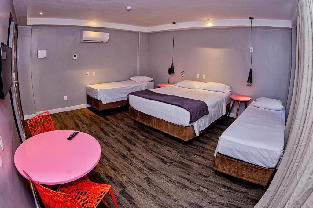 Postel nebo postele na pokoji v ubytování B Hotel Salvador