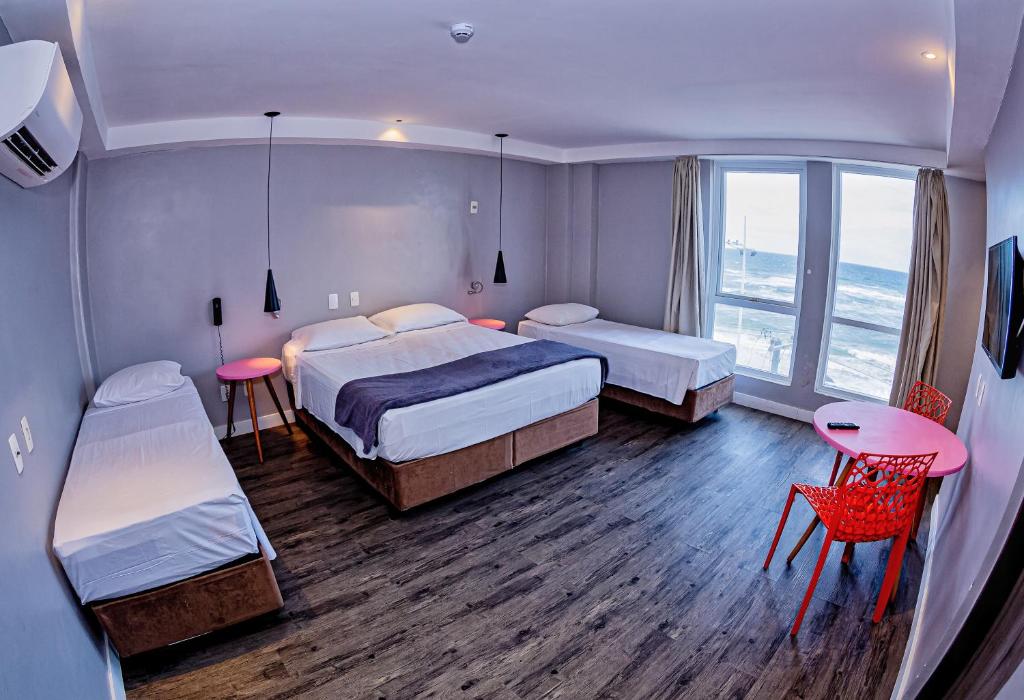 Postel nebo postele na pokoji v ubytování B Hotel Salvador