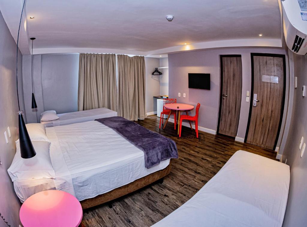 Postel nebo postele na pokoji v ubytování B Hotel Salvador
