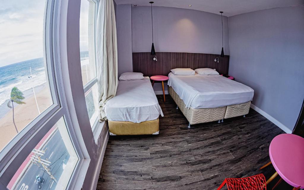 Postel nebo postele na pokoji v ubytování B Hotel Salvador