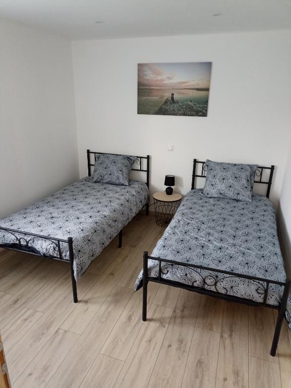 Cama ou camas em um quarto em Le LuMille