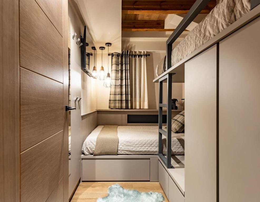 Postel nebo postele na pokoji v ubytování Cerdanya Mountain Residences