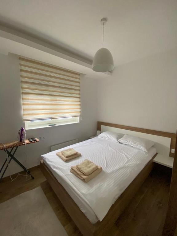 Postel nebo postele na pokoji v ubytování Apartman 13