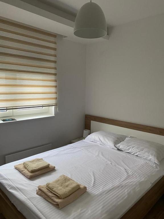 Postel nebo postele na pokoji v ubytování Apartman 13