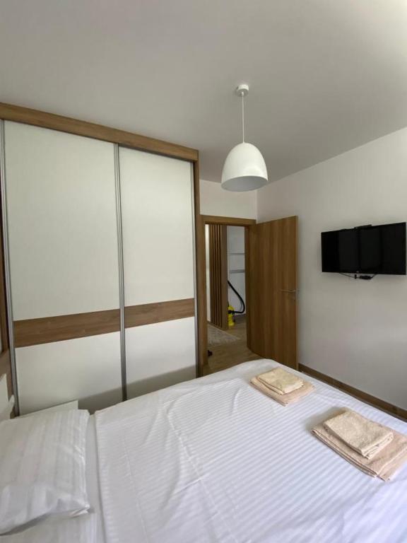 Postel nebo postele na pokoji v ubytování Apartman 13