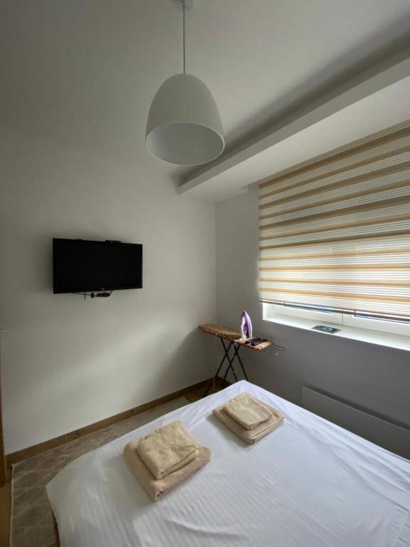 Postel nebo postele na pokoji v ubytování Apartman 13