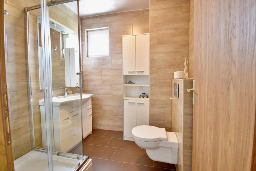 Kúpeľňa v ubytovaní Apartmani Solis