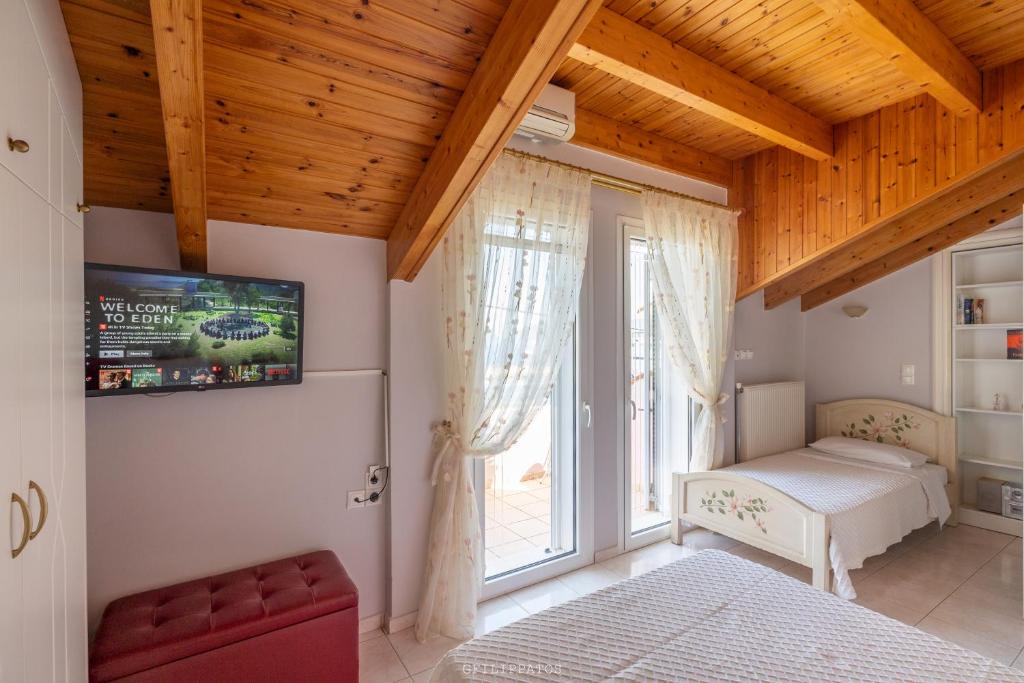 Postel nebo postele na pokoji v ubytování Captain's Gem