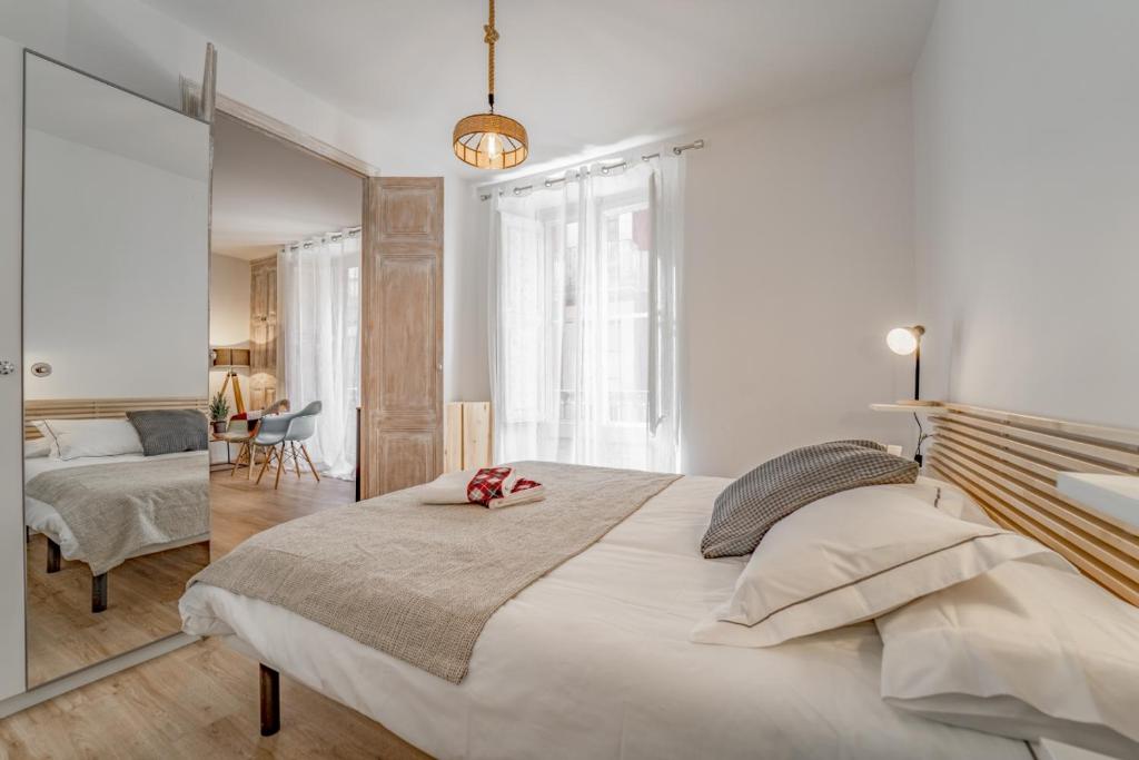 A bed or beds in a room at 3.1 Apartamento Cap del Bosc