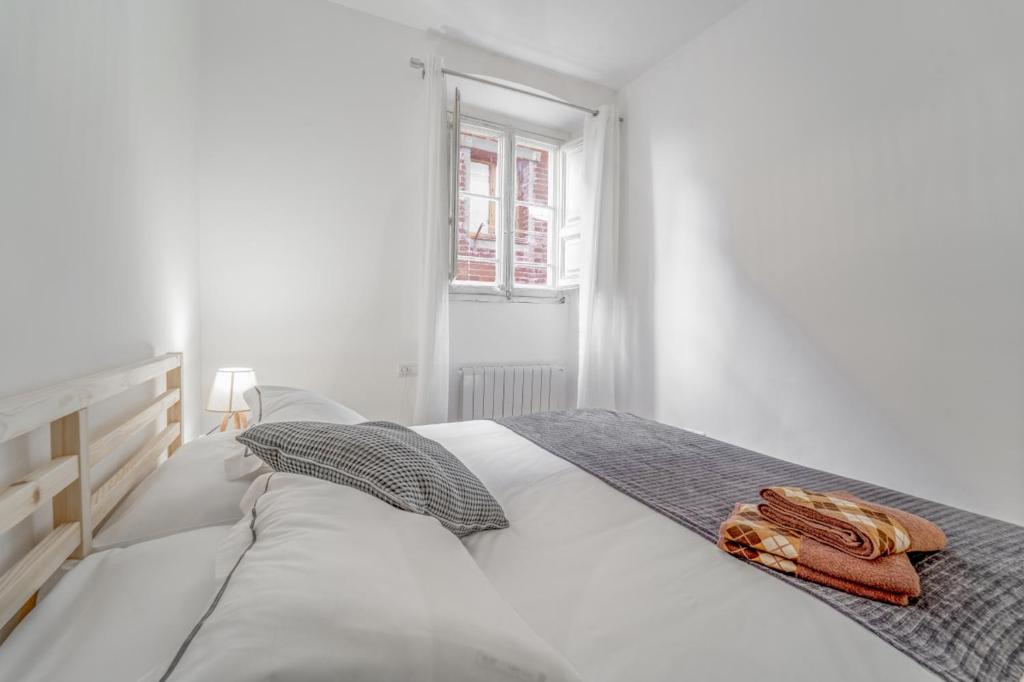 Postel nebo postele na pokoji v ubytování 3.2 Apartamento Coma Oriola