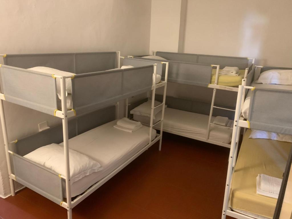 Postel nebo postele na pokoji v ubytování Short Stop Room