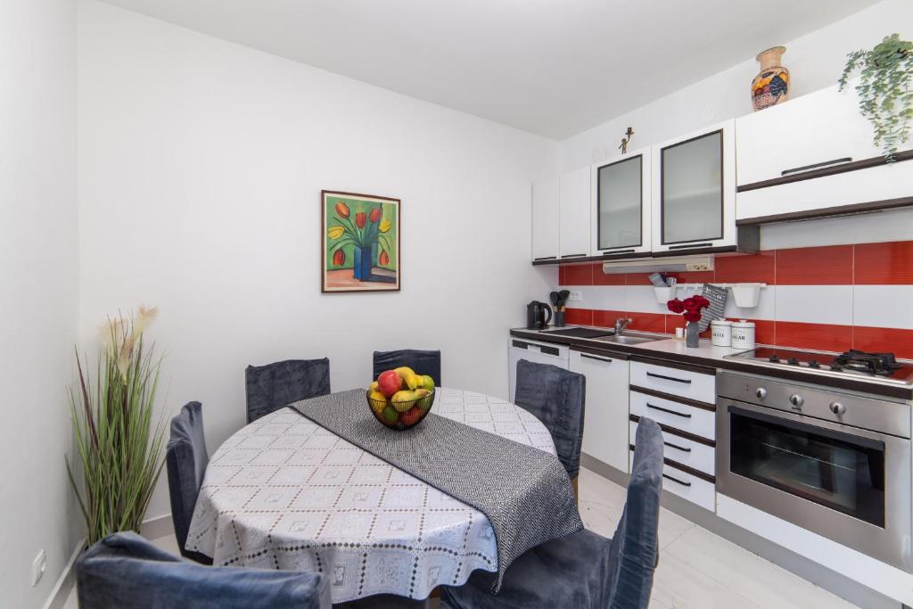 Kuchyňa alebo kuchynka v ubytovaní Apartman Porto