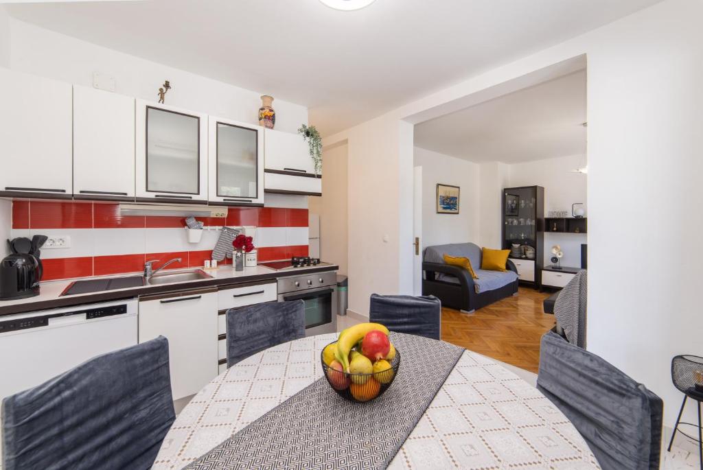 Kuchyňa alebo kuchynka v ubytovaní Apartman Porto