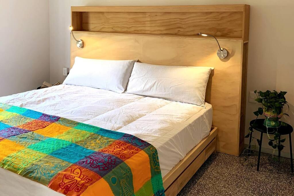 Ένα ή περισσότερα κρεβάτια σε δωμάτιο στο 122 LOFT CONFORT CENTRO HISTÓRICO CDMX
