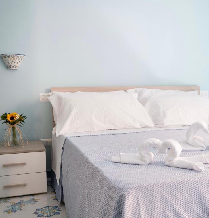 Posteľ alebo postele v izbe v ubytovaní B&B Margherita 2