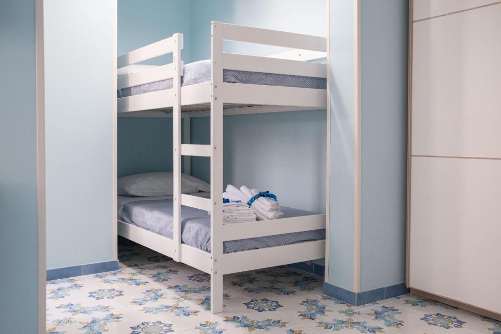 Posteľ alebo postele v izbe v ubytovaní B&B Margherita 2