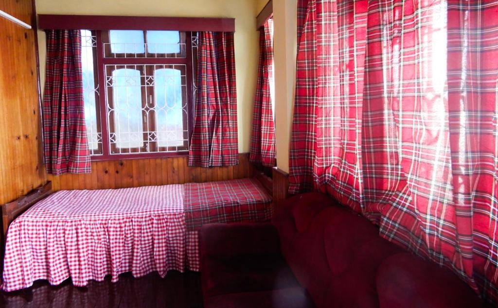 Postel nebo postele na pokoji v ubytování West Point Backpackers Hostel