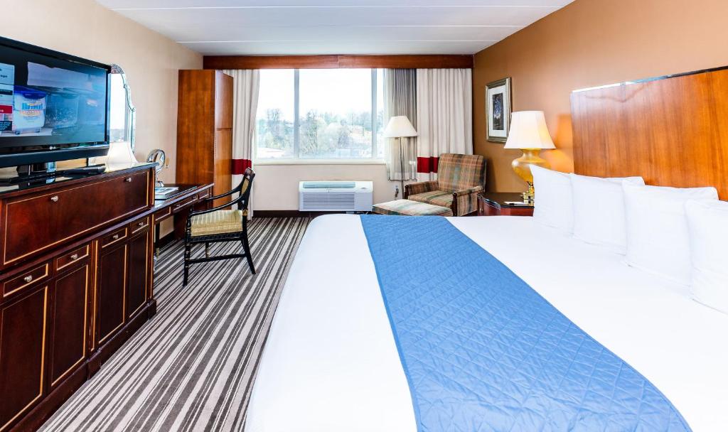 Postel nebo postele na pokoji v ubytování Metro Points Hotel Washington North