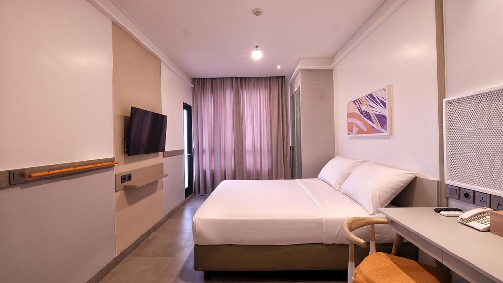 Una televisión o centro de entretenimiento en Joylive BSD City