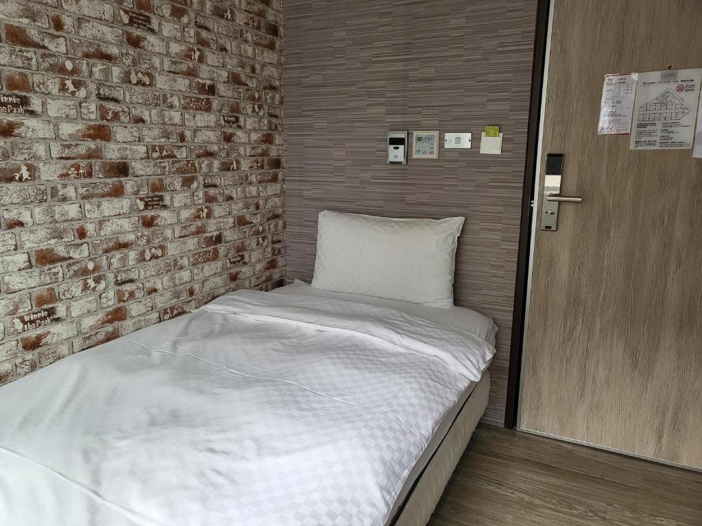 Postel nebo postele na pokoji v ubytování The Cole Hotel