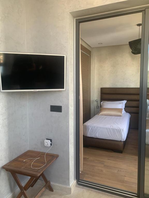 Giường trong phòng chung tại Hivernage