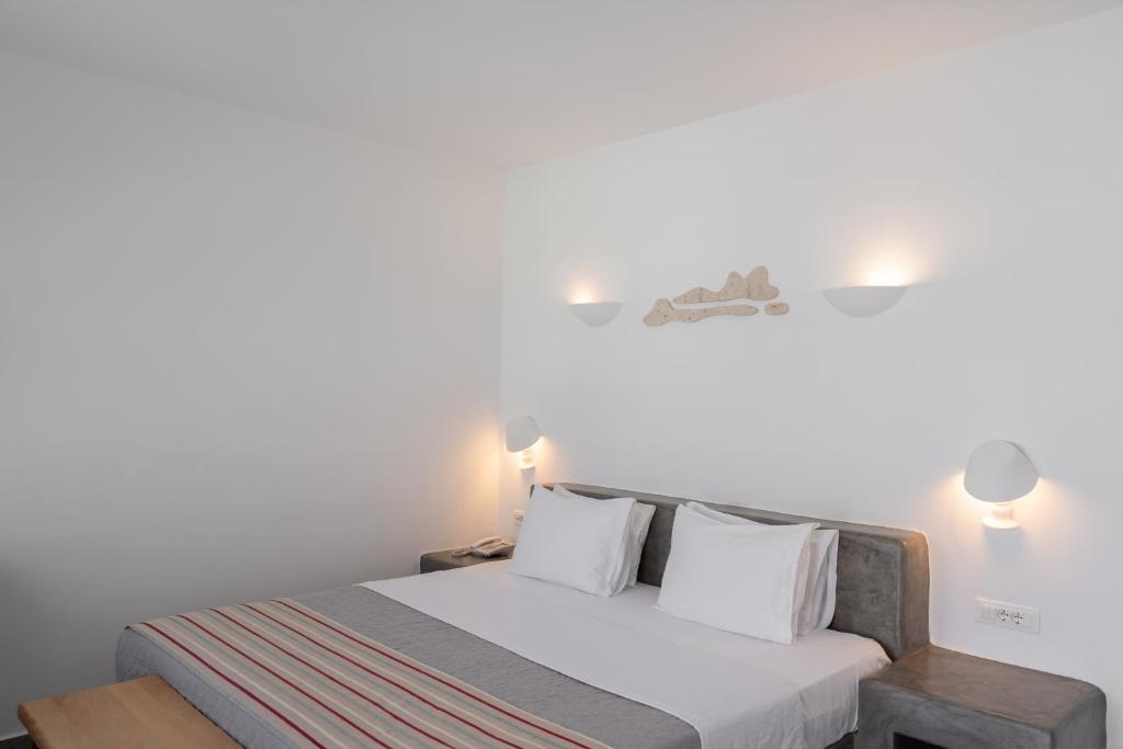 Letto o letti in una camera di Hotel Goulielmos