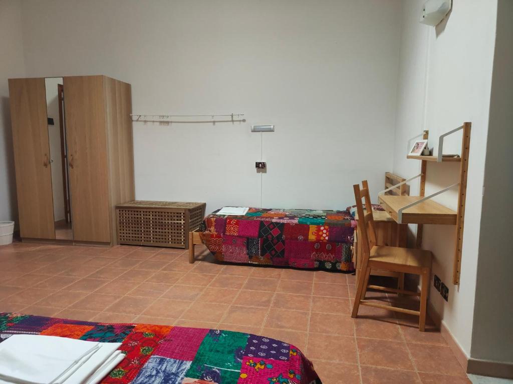 Posteľ alebo postele v izbe v ubytovaní Beteyà Hostel Don Bosco