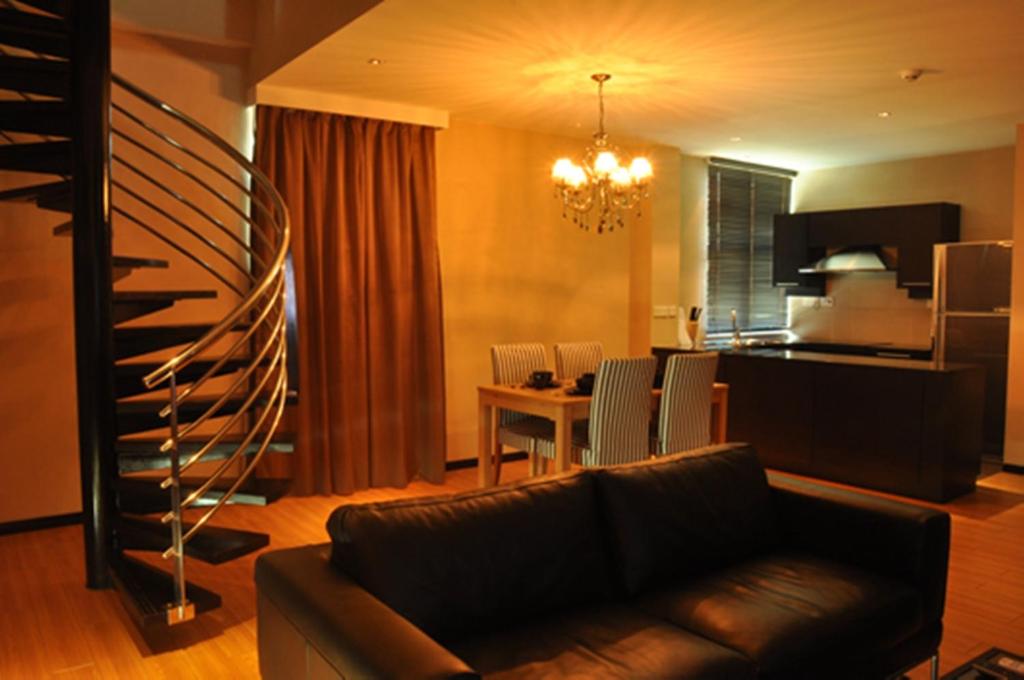 Kuchyň nebo kuchyňský kout v ubytování Tat Place Hotel
