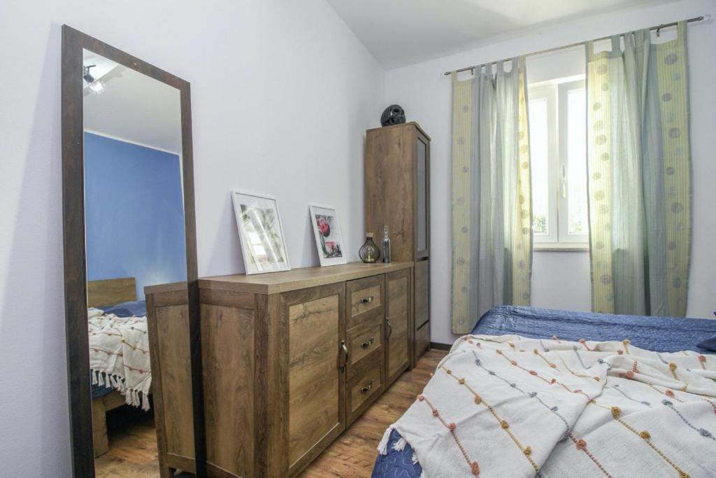 Postel nebo postele na pokoji v ubytování Mani in Pilkovići - Istrien