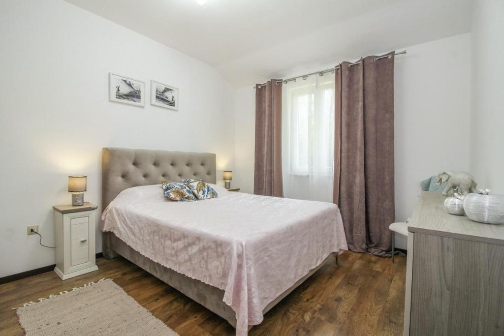 Postel nebo postele na pokoji v ubytování Mani in Pilkovići - Istrien