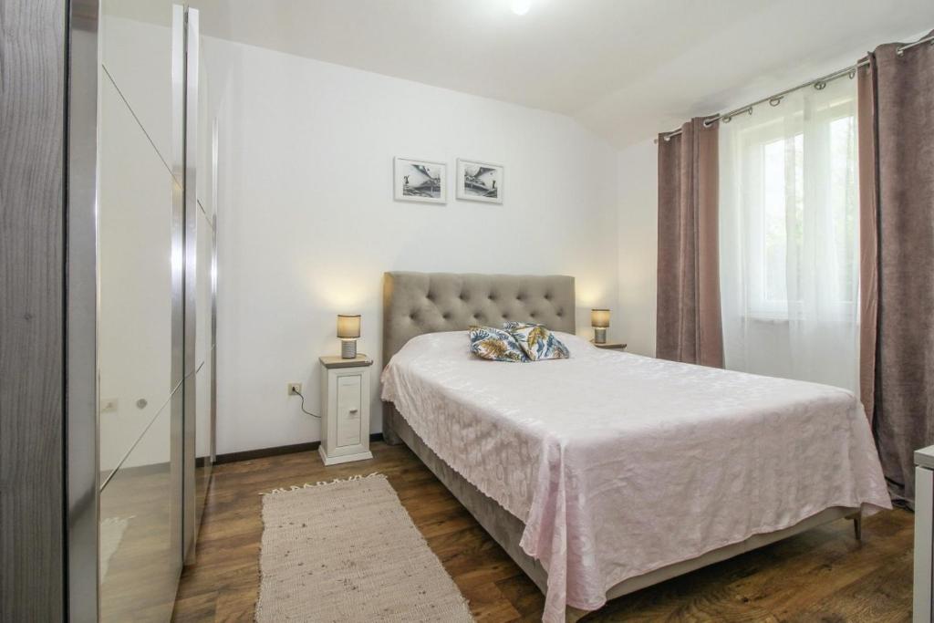 Postel nebo postele na pokoji v ubytování Mani in Pilkovići - Istrien