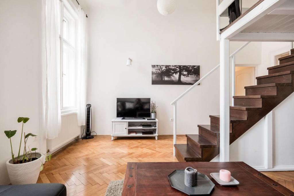Televízia a/alebo spoločenská miestnosť v ubytovaní Perfectday1 Budapest