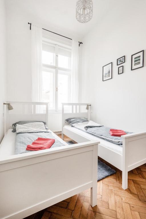 Posteľ alebo postele v izbe v ubytovaní Perfectday1 Budapest