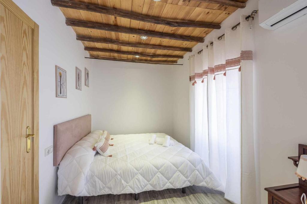 Postel nebo postele na pokoji v ubytování Casa Rural Maimones