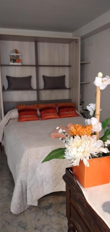 A bed or beds in a room at Casa rural Cal Fuster Experience