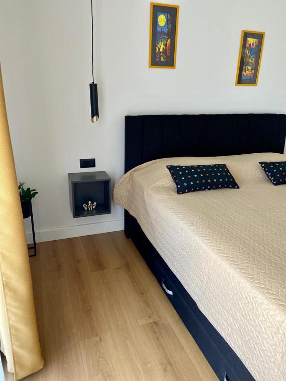 Postel nebo postele na pokoji v ubytování Portum rooms