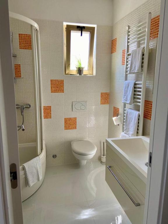Koupelna v ubytování Portum rooms