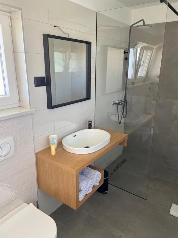 Koupelna v ubytování Portum rooms