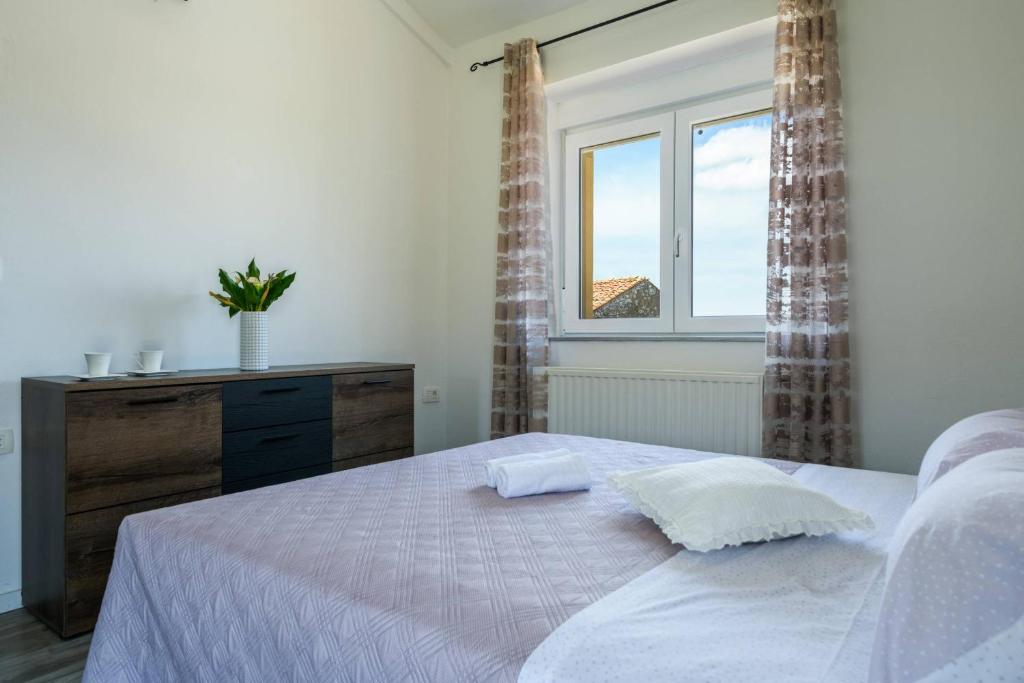 Postel nebo postele na pokoji v ubytování Holiday house Boky