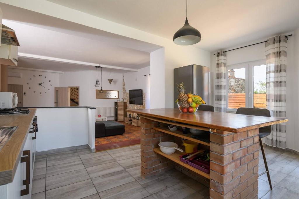 Kuchyň nebo kuchyňský kout v ubytování Holiday house Boky