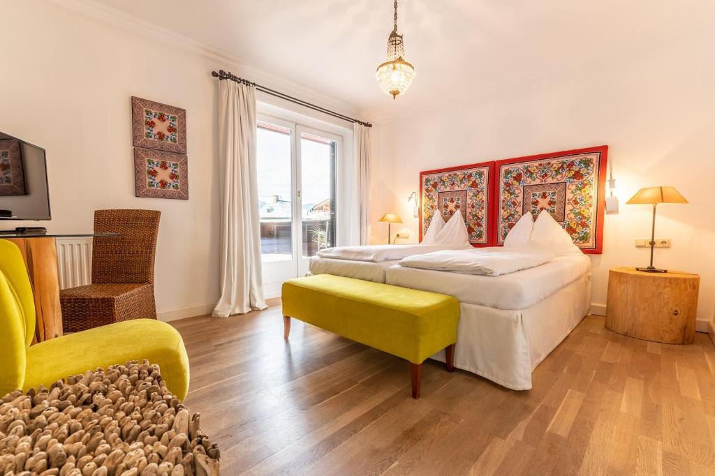 Postel nebo postele na pokoji v ubytování Hotel Bruggwirt