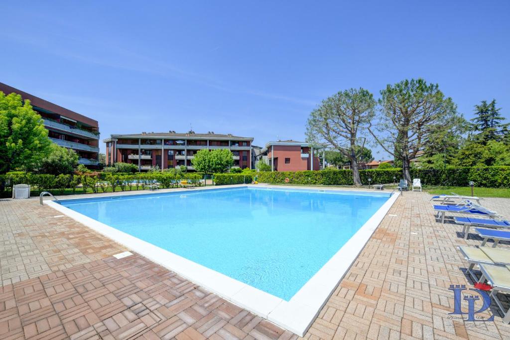 The swimming pool at or close to Desenzanoloft Official Partner MARRIOTT Homes & Villas - Dolce vita with Garden and Pools