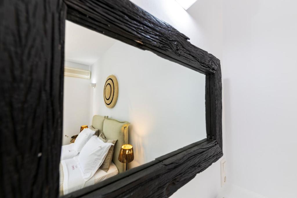 Postel nebo postele na pokoji v ubytování Nymfes Hotel