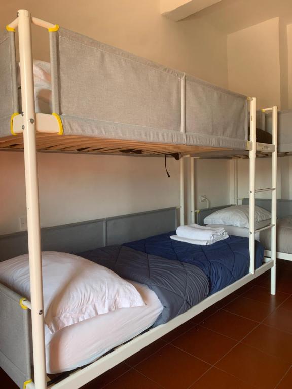 Postel nebo postele na pokoji v ubytování Short Stop Room