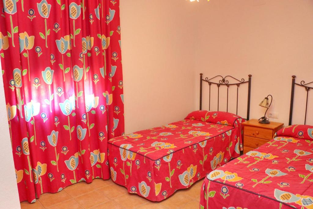 Postel nebo postele na pokoji v ubytování Chalet La Florida
