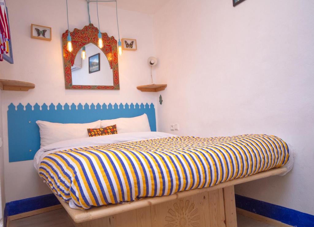 Postel nebo postele na pokoji v ubytování USHA Guest House