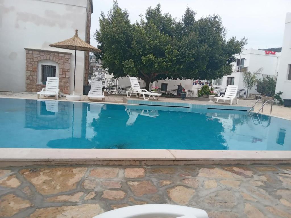 Kép Central and Comfortable Apartment with Shared Pool near Beach in Bodrum szállásáról Bodrumban a galériában