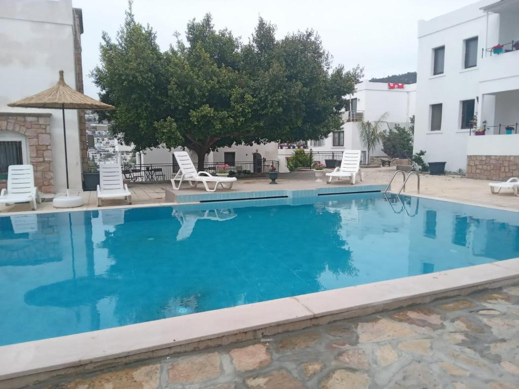 Kép Central and Comfortable Apartment with Shared Pool near Beach in Bodrum szállásáról Bodrumban a galériában